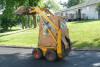 Rounder skid loader